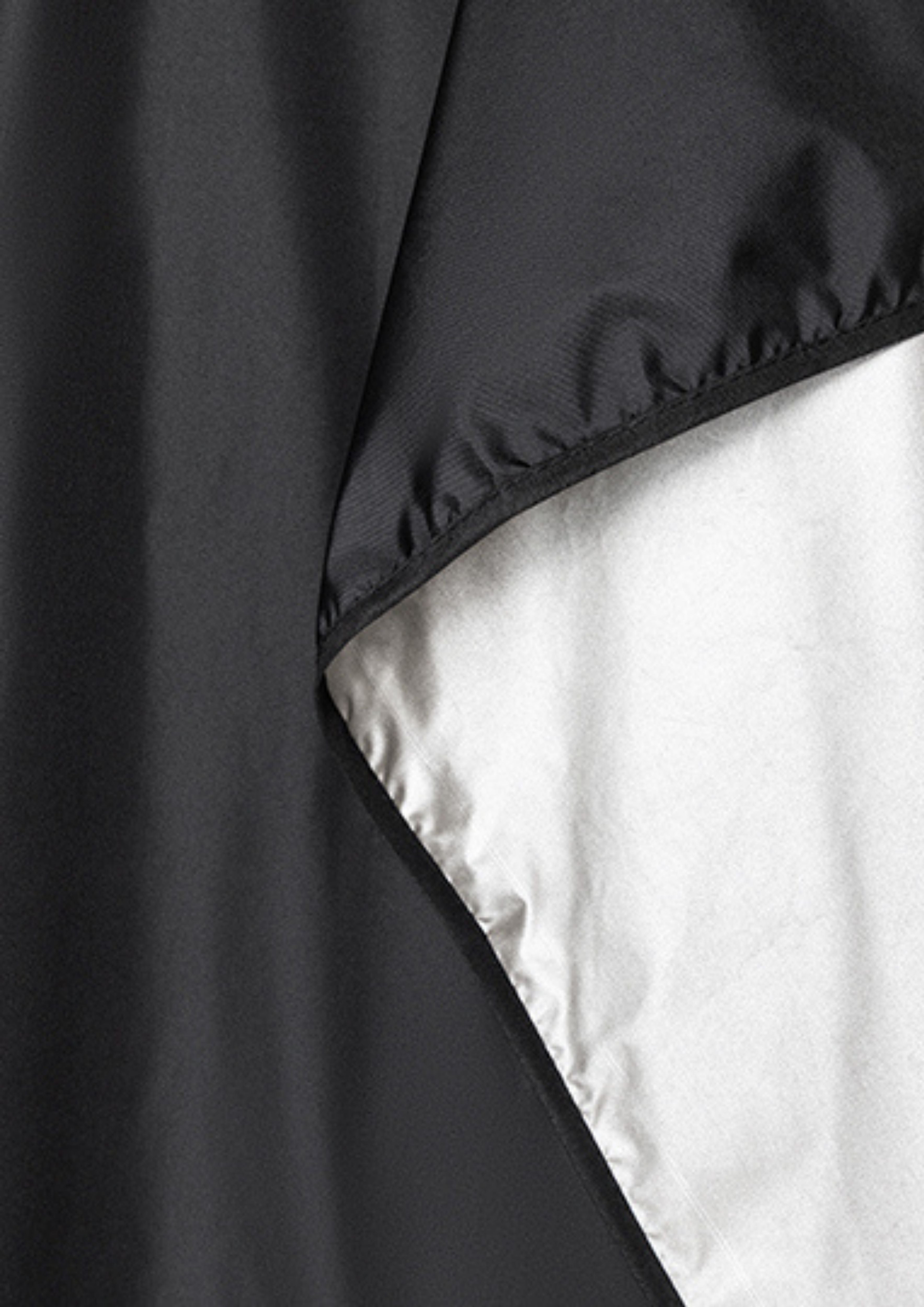 Friseurumhang mit Handdurchgriffen